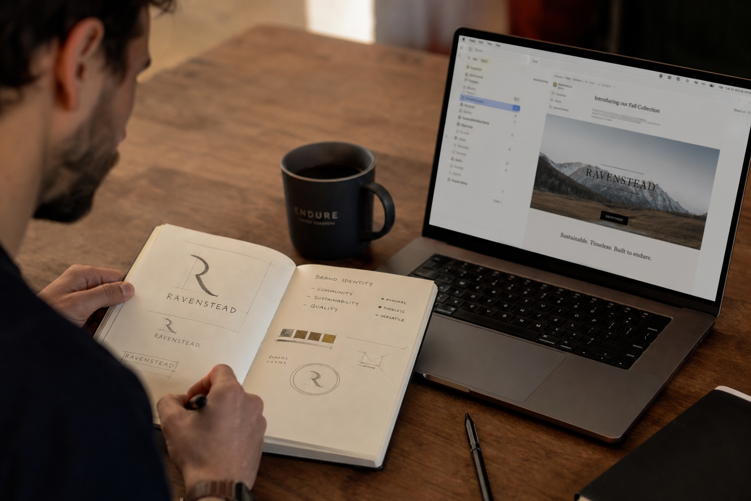 A founder sketching logo concepts in a notebook next to a laptop displaying an email marketing campaign