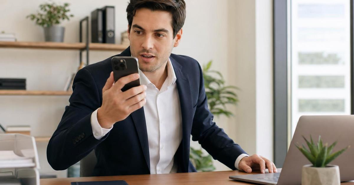 A sales rep picking up a phone call within seconds of a new lead notification appearing on their screen